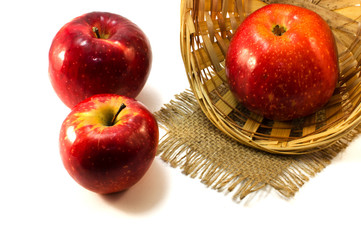 Apples on a limited background in the basket