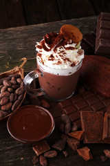 Hot chocolate or coffee with whipped cream in glass