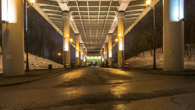 pedestrian motion under high overpass  to entrance of subway, time lapse
