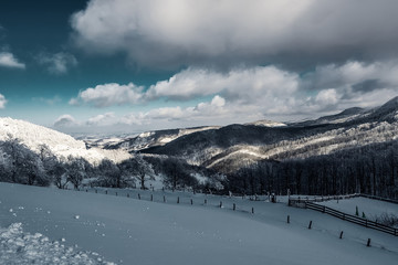 Fototapeta na wymiar Snowy winter breathtaking natural landscape