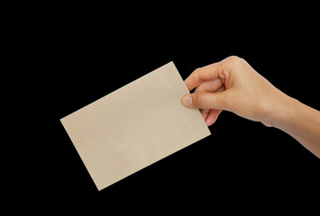 Obraz premium Woman hand holding brown envelope