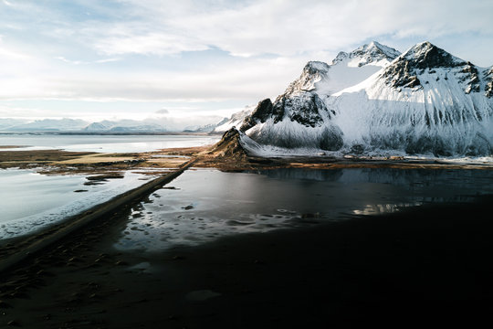 View of black sand beach with Vesturhorn mountain in background