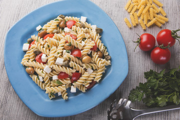 pasta with tomatoes goat cheese olives