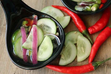 Pickles cucumber and onion in vinegar
