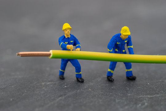 Miniature with powercable for connecting concept.