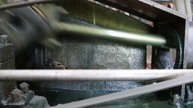 old machine working by water steam engine in agricultural factory