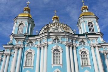 Fototapeta premium The Golden Domes of St. Nicholas Naval Cathedral, St. Petersburg, Soaring towards the Sky
