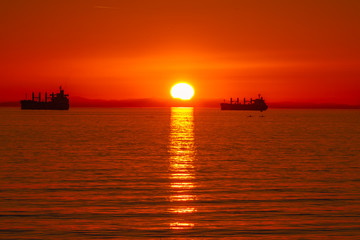 red sunset with ocean sky line