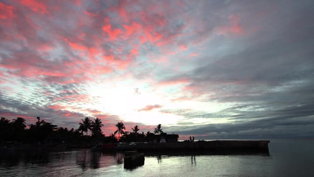 Time-lapse approach of dawn on the island of Biak. Andreev.