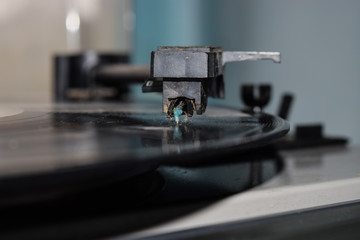 Fototapeta na wymiar vinyl disk on old turntable