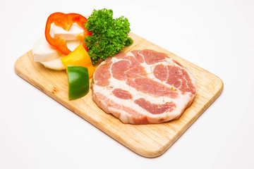 raw pork meat and vegetables