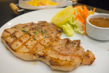 Pork Chop Grilled steak with French Fries