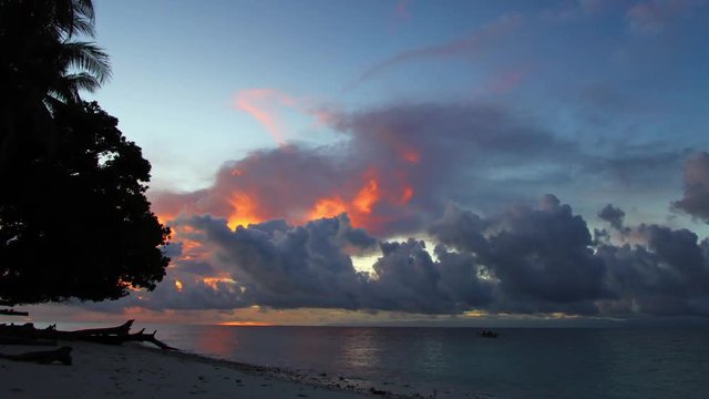 Time-lapse of a bright sunset in the clouds. Andreev.