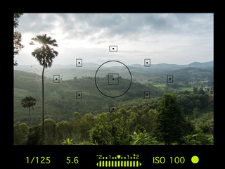 camera viewfinder with exposure photo and camera settings.