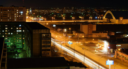 Fototapeta na wymiar Night city. View of the city. Roads of the city.