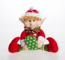 toy or christmas angel soft toy on the background.