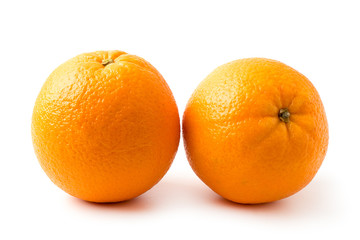 Two ripe oranges closeup.