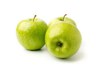 Three ripe green Apple isolated.