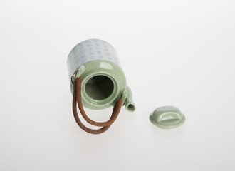 tea pot or ceramic teapot on background.