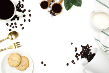 Top view mockup on white background with a cup of coffee, coffee beans, milk and cookie.