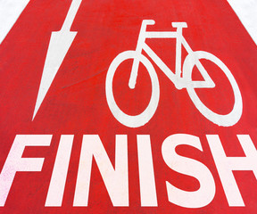 Finish White graphic signs of arrow with bicycle