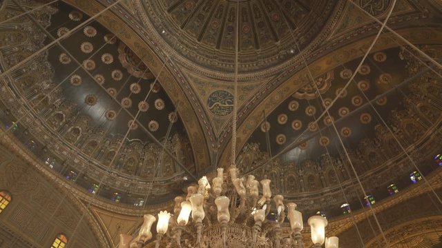 tilt down shot of a chandelier in the alabaster mosque of cairo, egypt