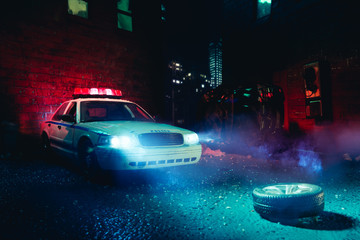 Police car arriving near a car crash / scale model scene