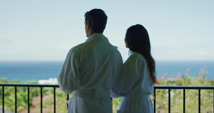 Couple relaxing enjoying morning on vacation at luxury hotel