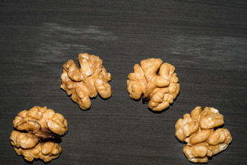 walnuts on black background. Top view with copy space for your text