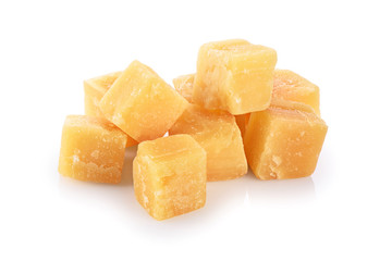 Pieces of parmesan cheese isolated on white background.
