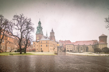 Wawel castle in Krakow during a snowy day at Christmas, the historic Polish city, Europe.