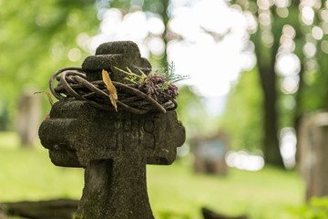 Cemetery cross with wreath