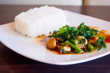 Rice with stir-fried seafood and basil