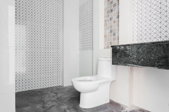 Modern design home bathroom White sanitary ware in the bathroom. Under construction