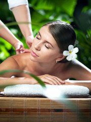 portrait of young beautiful woman in spa environment.  