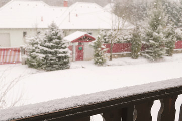 winter scene in backyard, snow covered street neighborhood