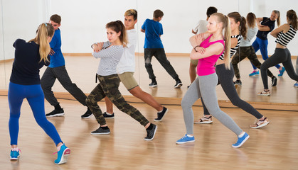  young students having dancing class