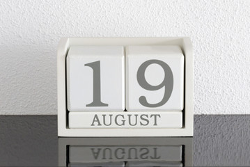 White block calendar present date 19 and month August