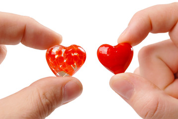 two red hearts in your fingers