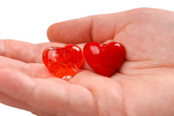two red hearts in the palm
