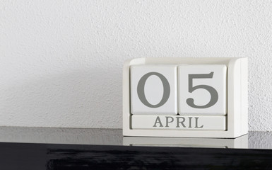 White block calendar present date 5 and month April