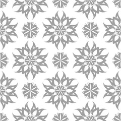 Gray floral ornament on white background. Seamless pattern