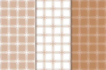 Set of geometric ornaments. Brown and white seamless patterns