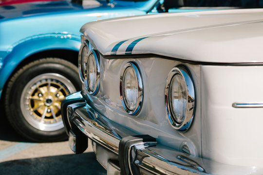 Fototapeta Crop fragments of retro cars in row