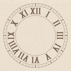 Ancient clock face with roman numerals. On beige background