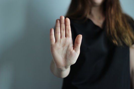 Woman's Hand Showing Reject, Stop, Break, Pause Gesture