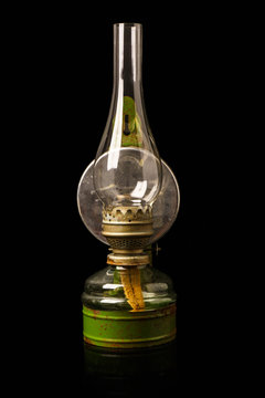 Old antique kerosene oil lantern lamp with  vintage glass chimne