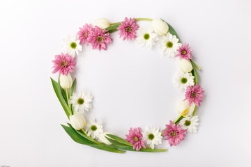 Green composition with white and pink flowers