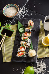 sushi on the black background