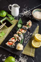 Fototapeta na wymiar sushi on the black background